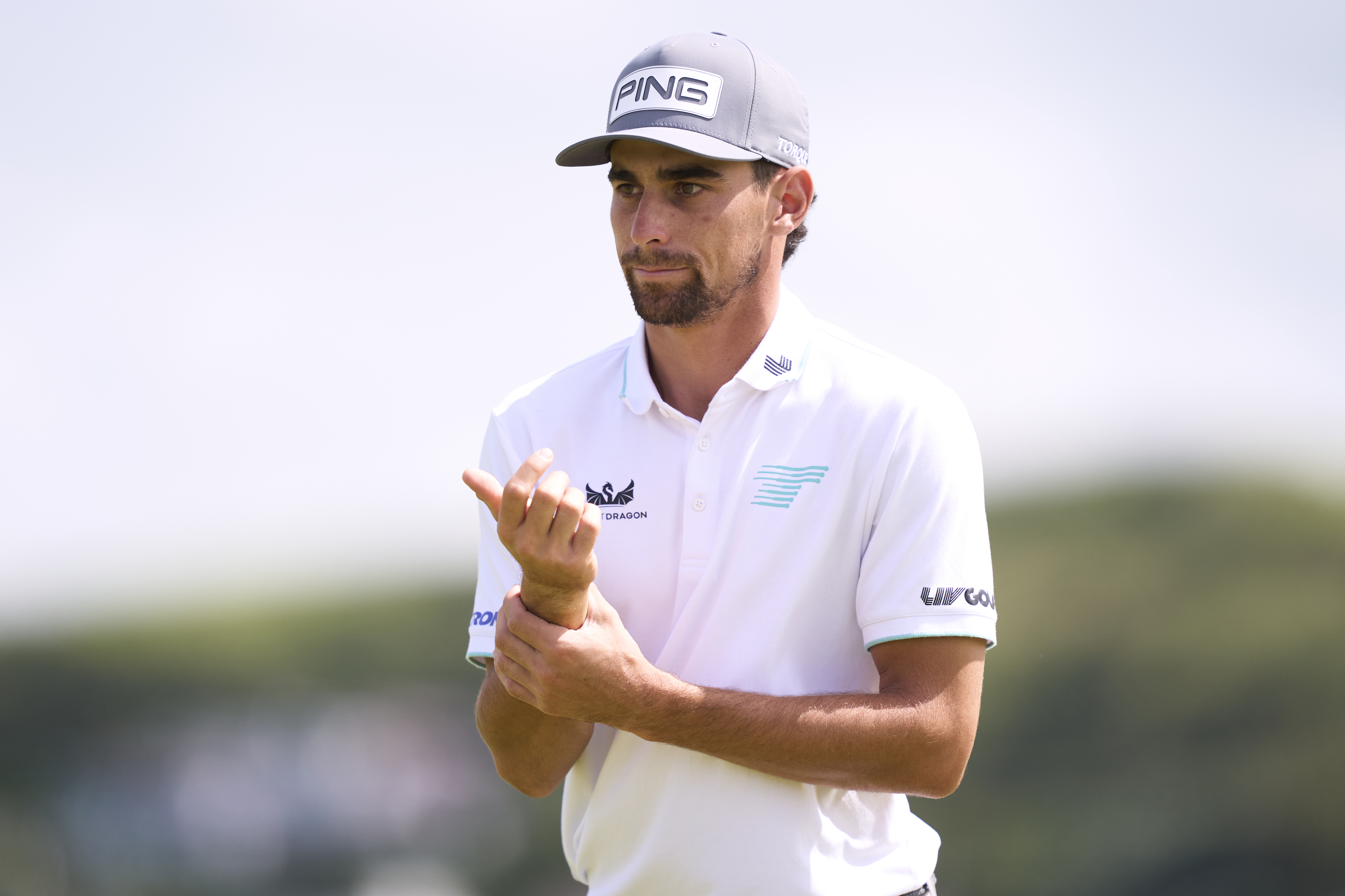 Joaquin Niemann looks on
