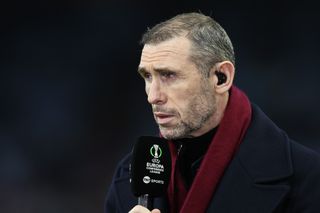 Martin Keown working as a television pundit during Aston Villa's Europa League clash against Ajax in March 2024.