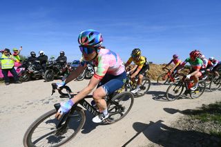 ROUBAIX FRANCE APRIL 16 LR Elise Chabbey of Switzerland and CanyonSRAM Racing Team and Elisa Longo Borghini of Italy and Team Trek Segafredo compete passing through a cobblestones sector during the 2nd ParisRoubaix 2022 Womens Elite a 1247km one day race from Denain to Roubaix ParisRoubaixFemmes ParisRoubaix on April 16 2022 in Roubaix France Photo by Tim de WaeleGetty Images