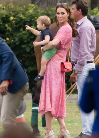 Catherine, Duchess of Cambridge and Prince Louis attend The King Power Royal Charity Polo Day at Billingbear Polo Club on July 10, 2019 in Wokingham, England