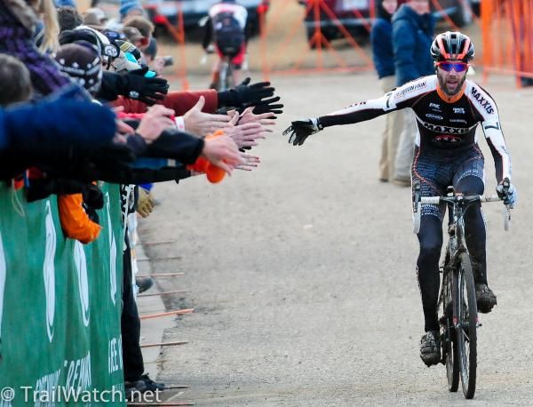 Geoff Kabush celebrates on his way to the line.