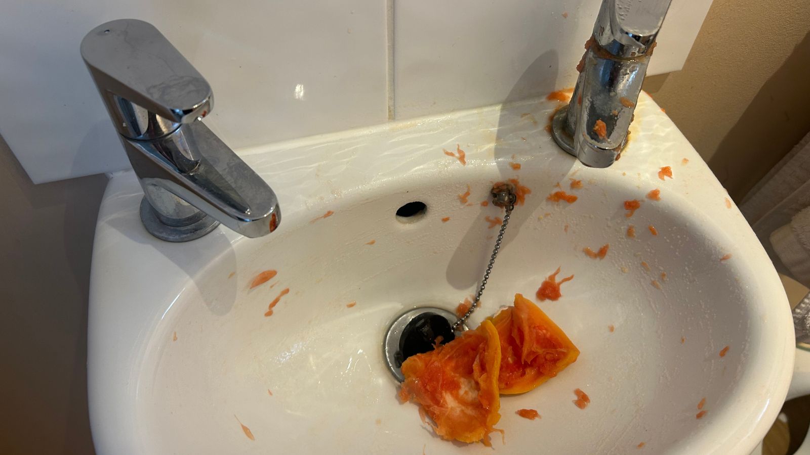 During cleaning hack with grapefruit and salt on a bathroom sink