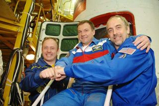 Space Tourist, Station Crew to Launch Sunday