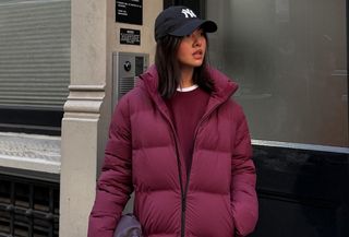 woman in burgundy puffer coat