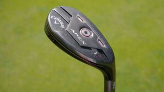 Callaway Apex Pro Hybrid showing off its sole plate on the golf course