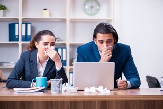 These office workers didn't get the memo that sick people should work from home.