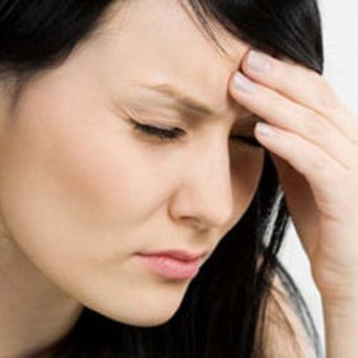 stressed woman with a headache