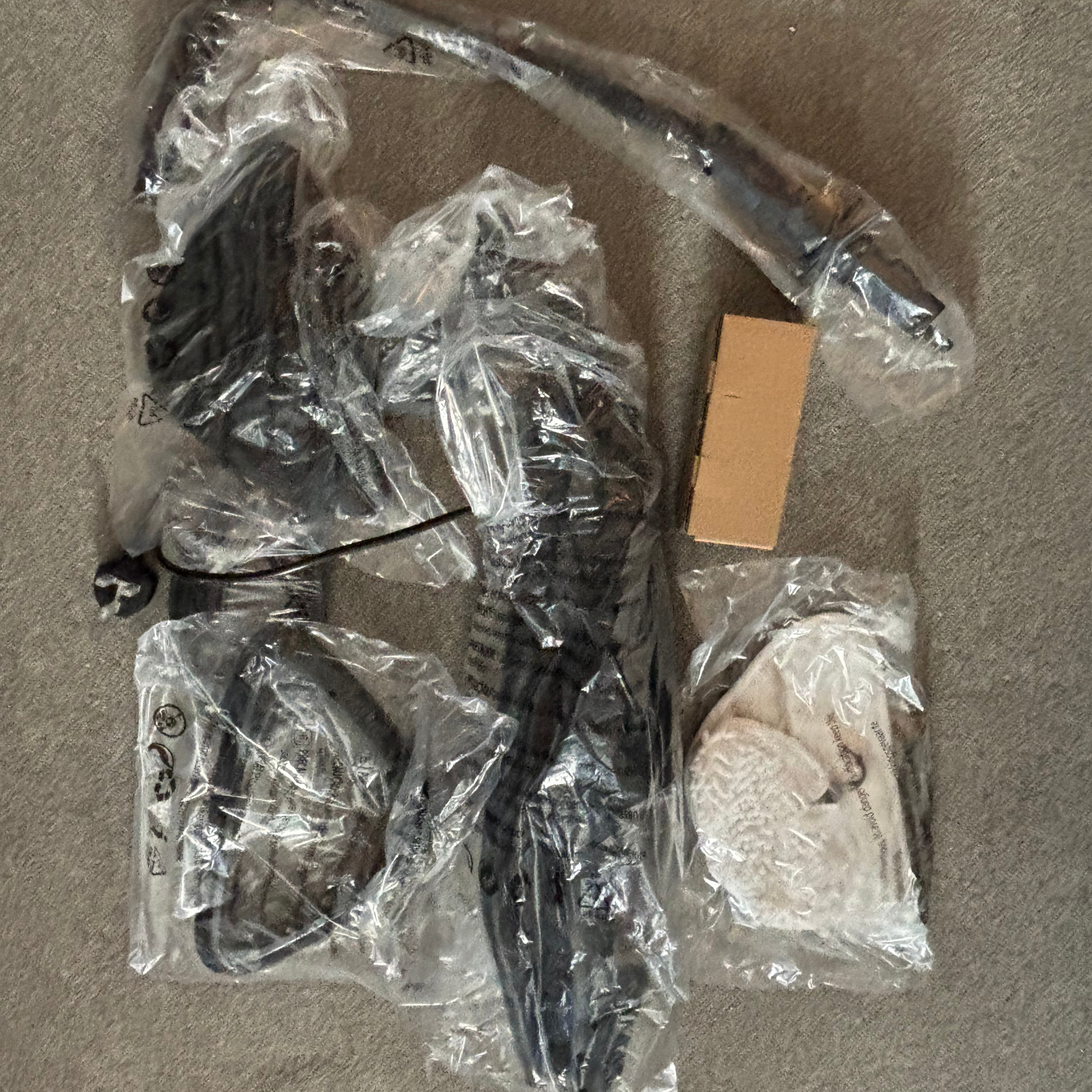 Individual parts wrapped in plastic wrapping