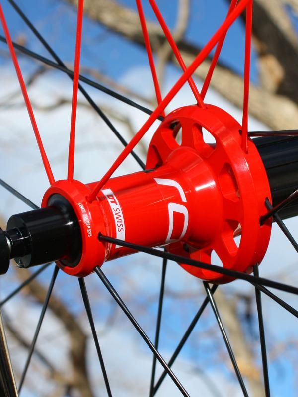 The machined high-low flanges are designed to help equalize spoke tension between the two side