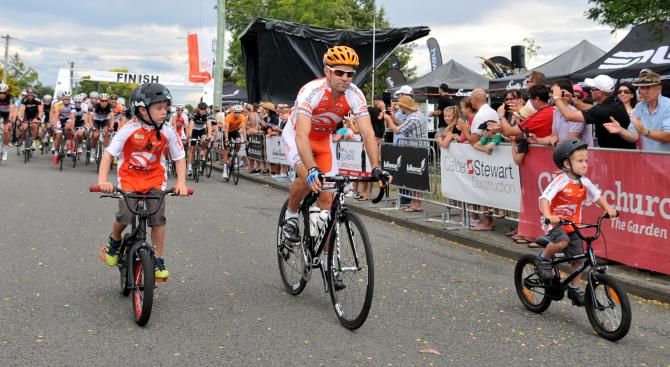 Julian Dean and sons Tanner (left) and Val start the race in his final ride as a professional.