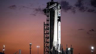 SpaceX's Crew-6 Crew Dragon and Falcon 9 rocket stand atop Pad 39A of NASA's Kennedy Space Center in Cape Canaveral, Florida at sunset on Feb. 28, 2023.
