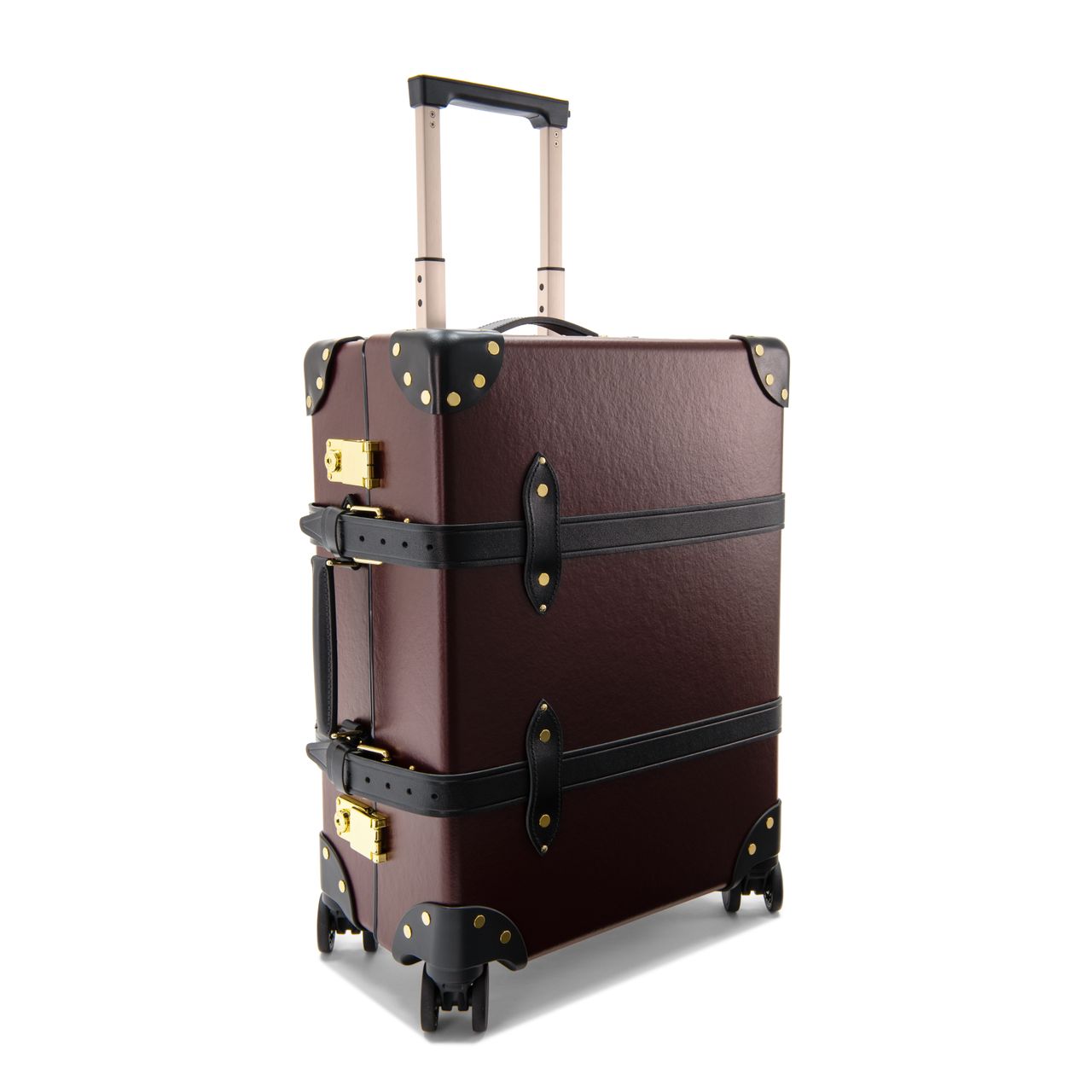 Oxblood suitcase photographed at an angle on a white background