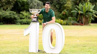 Novak Djokovic celebrates his tenth Australian Open title