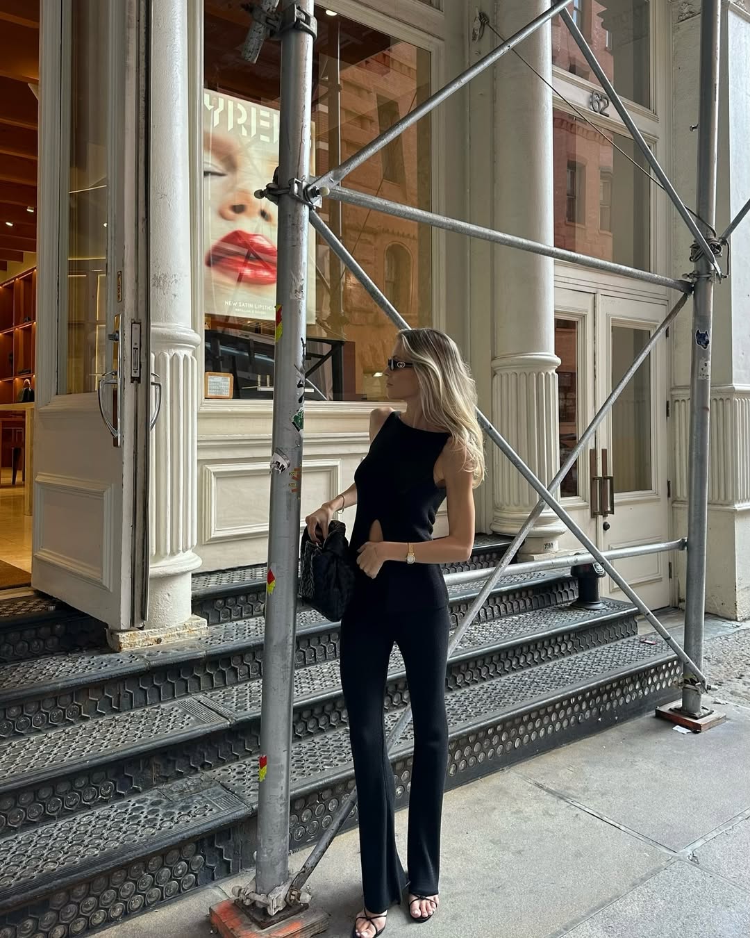 woman wearing flattering black pants with slight flare