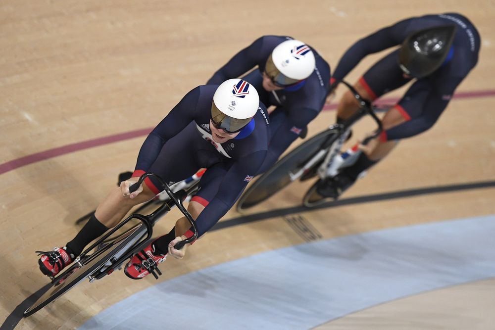 Britain's Philip Hindes, Britain's Jason Kenny and Britain's Callum Skinner compete in the men's Team Sprint