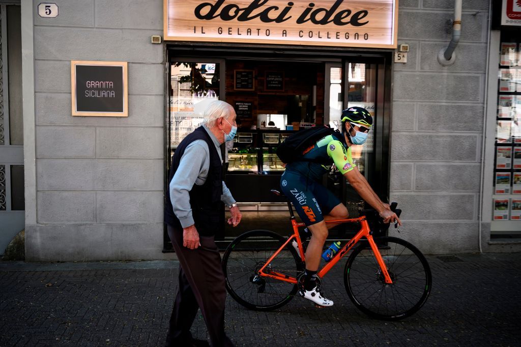 Umberto Marengo (Vini Zab&ugrave;-KTM) picks up his latest food package to deliver in his local Piedmont community