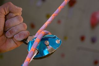 types of belay device: assisted belay device