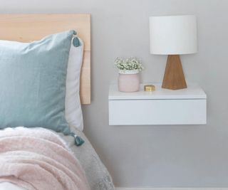 floating bedside drawer in a pastel colored room