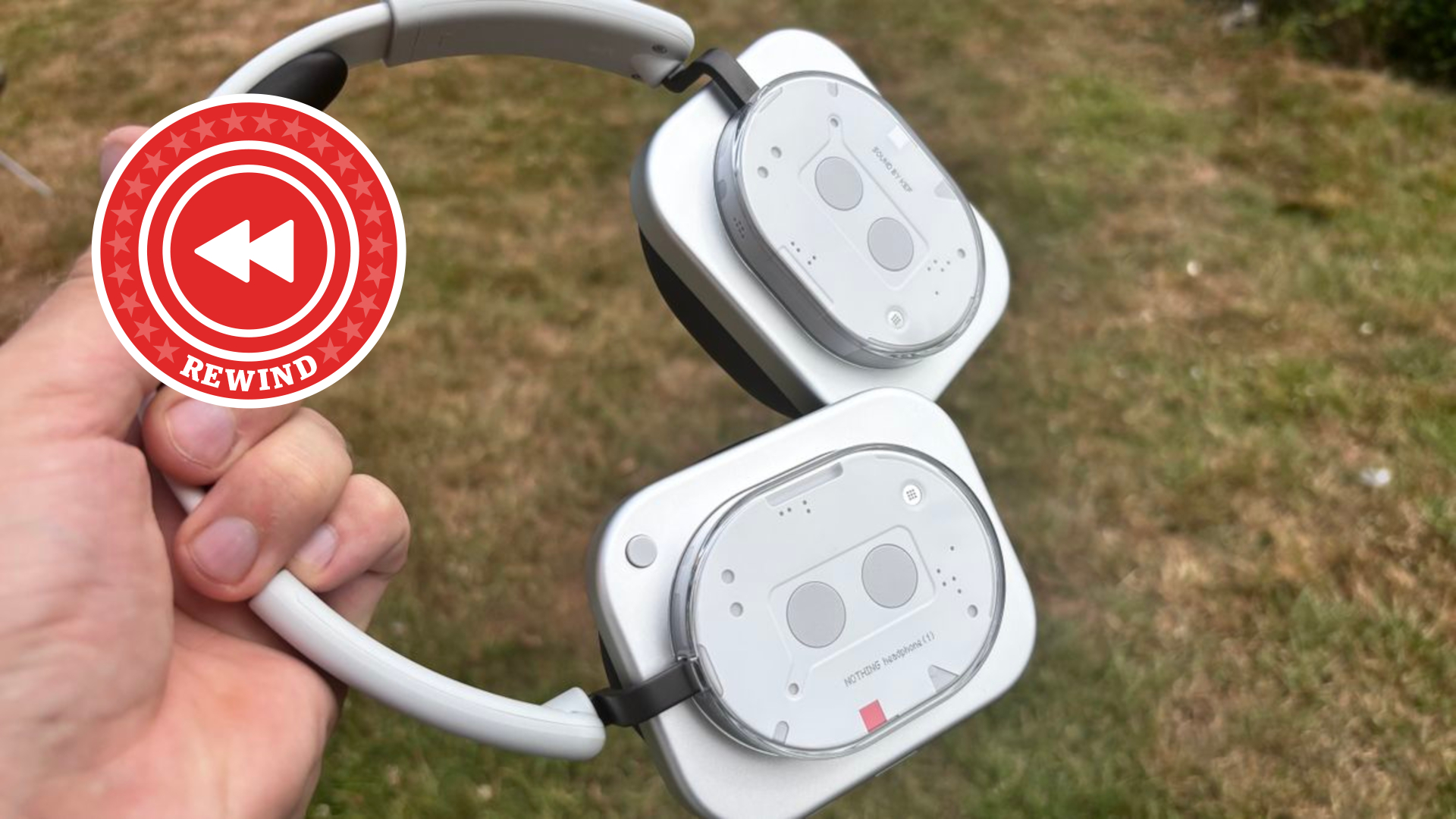 Nothing Headphones (1) with Rewind logo