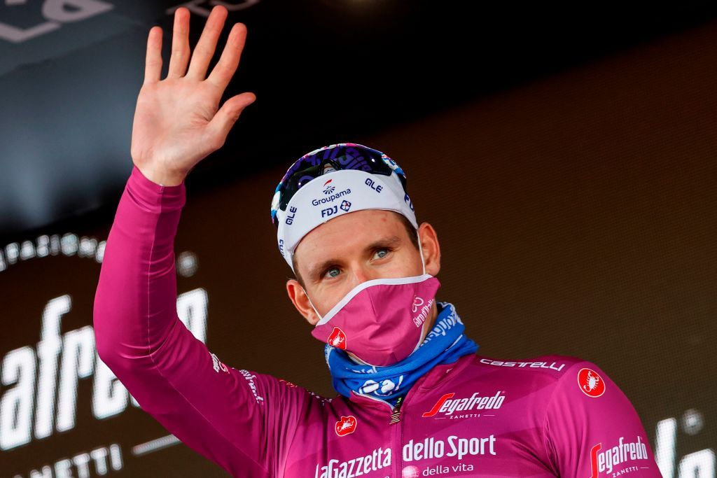 Team GroupamaFDJ rider Frances Arnaud Demare wearing a face mask celebrates on the podium after receiving the ciclamino jersey for points classification in the 8th stage of the Giro dItalia 2020 cycling race a 200kilometer route between Giovinazzo and Vieste on October 10 2020 Photo by Luca Bettini AFP Photo by LUCA BETTINIAFP via Getty Images
