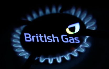 Flames from a gas burner and British Gas logo displayed on a phone screen