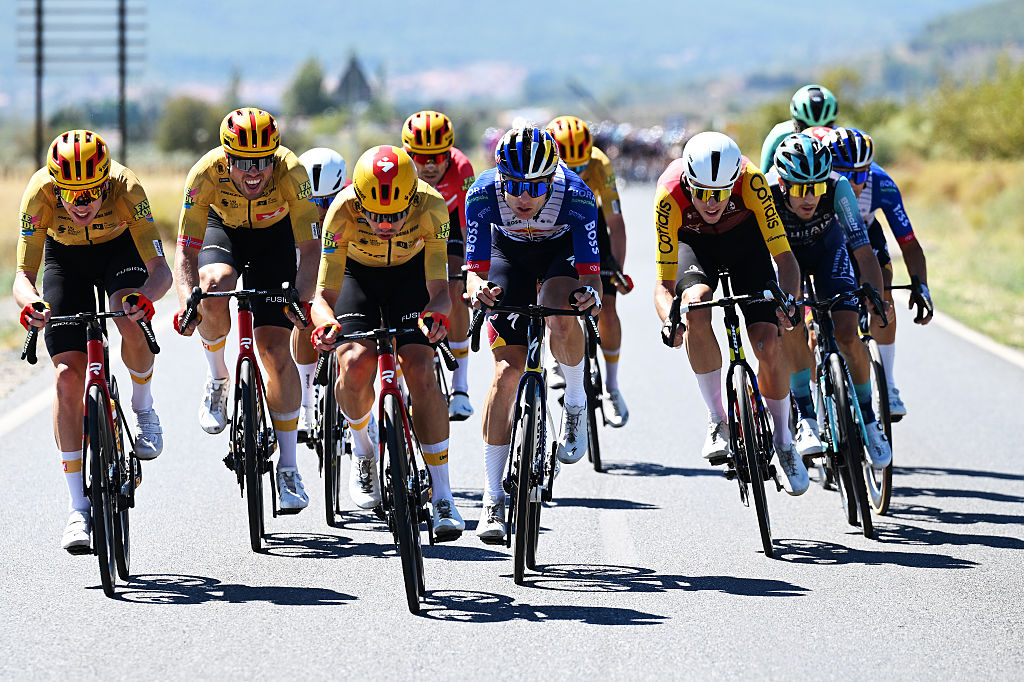 COLLADO DEL AGUACIL, SPAIN - SEPTEMBER 12: (L-R) Andreas Kron of Denmark and Team Uno-X Mobility, Finn Fisher-Black of New Zealand and Team Red Bull - BORA - hansgrohe and Louis Rouland of France and Team Cofidis attack during the La Vuelta - 81st Tour of Spain 2026, Stage 20 a 210.8km stage from La Calahorra to Collado del Alguacil 1887m / #UCIWT / on September 12, 2026 in Collado del Alguacil, Spain. (Photo by Tim de Waele/Getty Images)