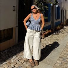 An image of @rebeccaferrazwyatt wearing one of the best gingham tops.