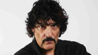 Carmine Appice posing for a photograph