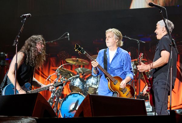 Paul McCartney onstage with Dave Grohl and Pat Smear