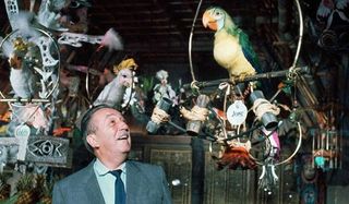 Walt Disney with birds from the Enchanted Tiki Room