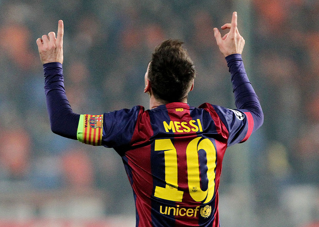 Lionel Messi celebrates scoring a goal during their UEFA Champions League football match against Apeol at the Neo GSP Stadium in the Cypriot capital, Nicosia, on November 25, 2014.