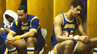 Jamaal Wilkes and Kareem Abdul-Jabbar look upset in the LA Lakers locker room in Winning Time on HBO