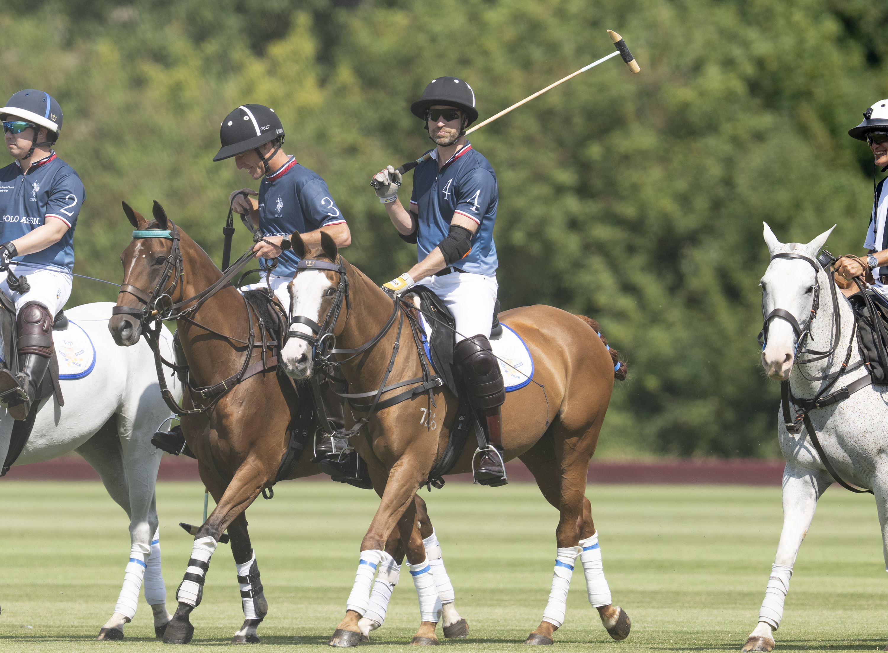 Prince William playing polo