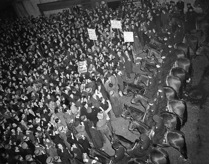 Protesters outside of a New York City pro-Nazi rally in 1939.
