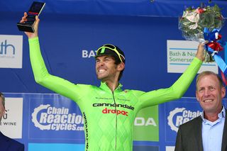 Jack Bauer celebrates his stage 5 win on the podium at the Tour of Britain.