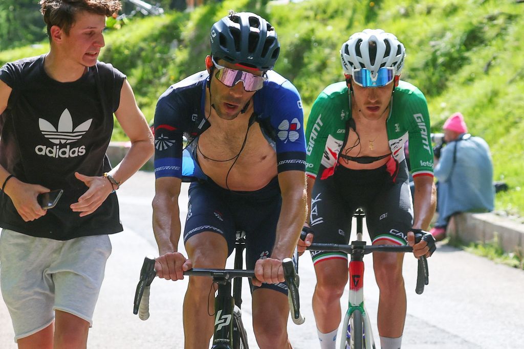 Groupama FDJs French rider Thibaut Pinot C leads the breakaway with Team Jayco AlUlas Filippo Zana rider Filippo Zana R during the eighteenth stage of the Giro dItalia 2023 cycling race 161 km between Oderzo and Val di Zoldo on May 25 2023 Photo by Luca Bettini AFP Photo by LUCA BETTINIAFP via Getty Images