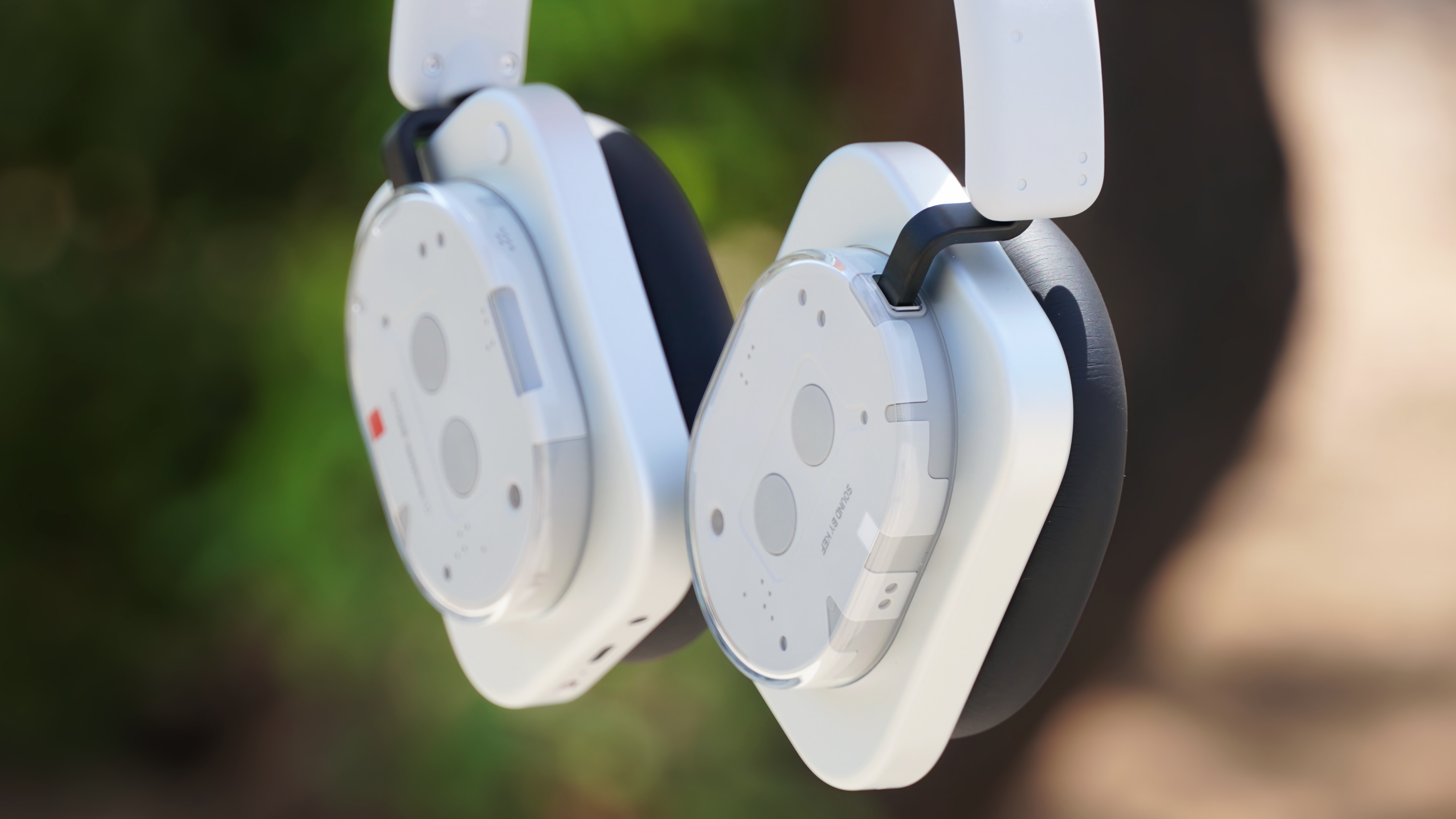 A tilted view of the Nothing Headphone 1 outdoors.