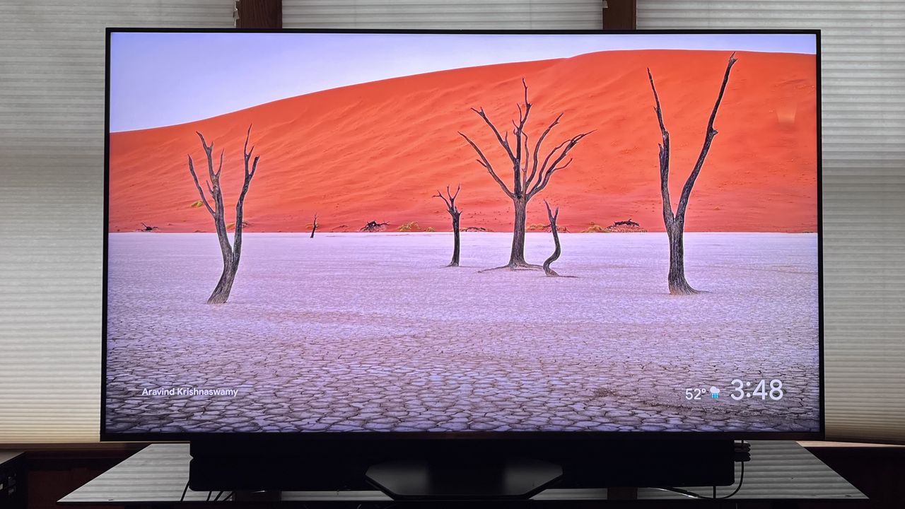 Hisense U8QG showing image of trees with orange background