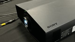 Sony Bravia Projector 9 on a black tablecloth