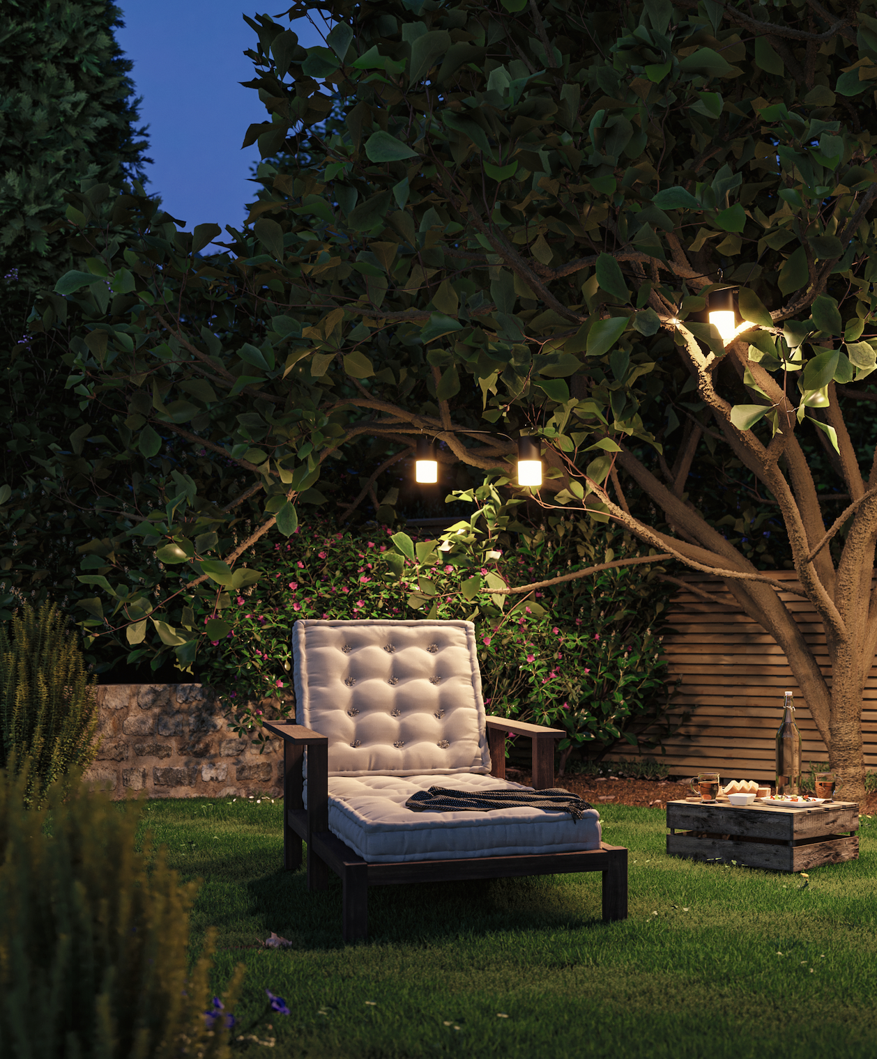 outdoor lounger underneath string lights