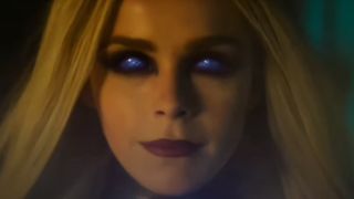 Kiernan Shipka staring with icy blue eyes as Gryla in Red One