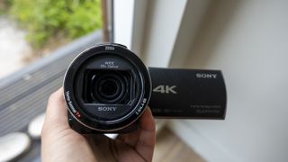 The Sony FDR-AX53 camcorder lens up-close