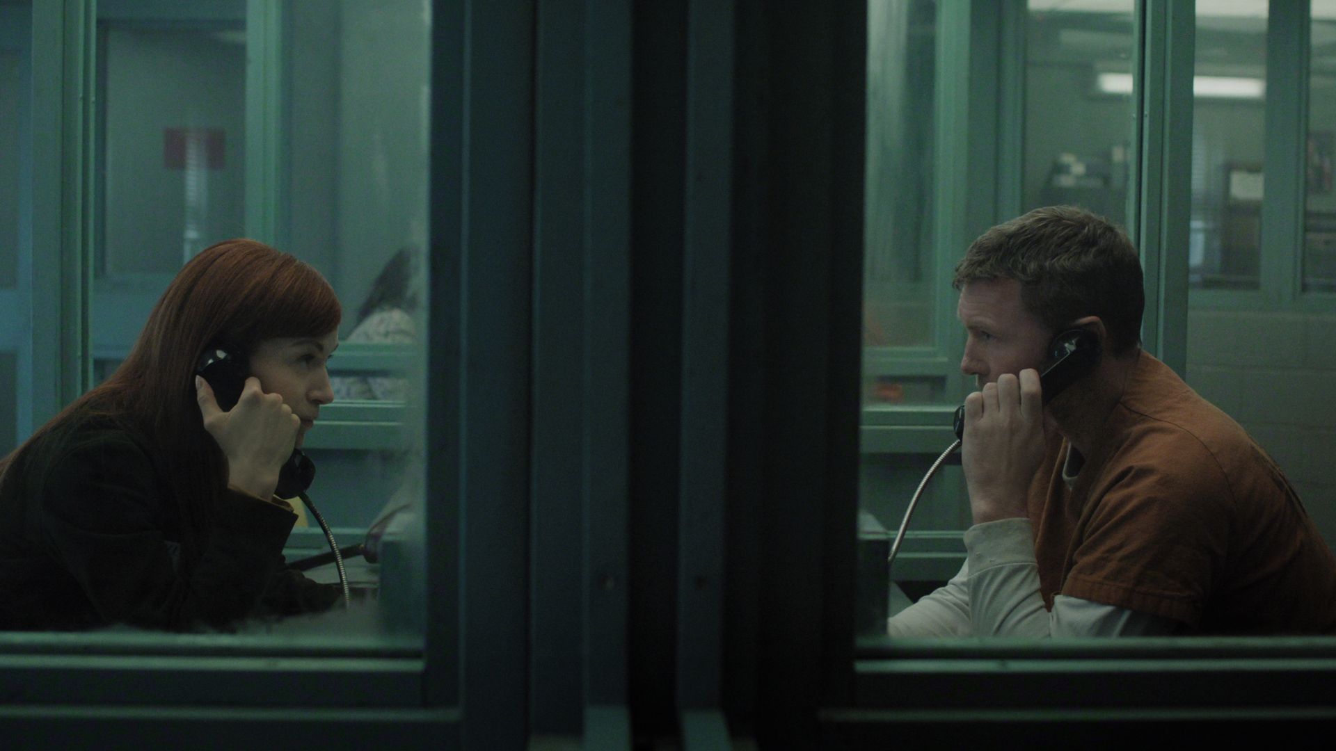 David and Rachel talk to each other on a prison phone system