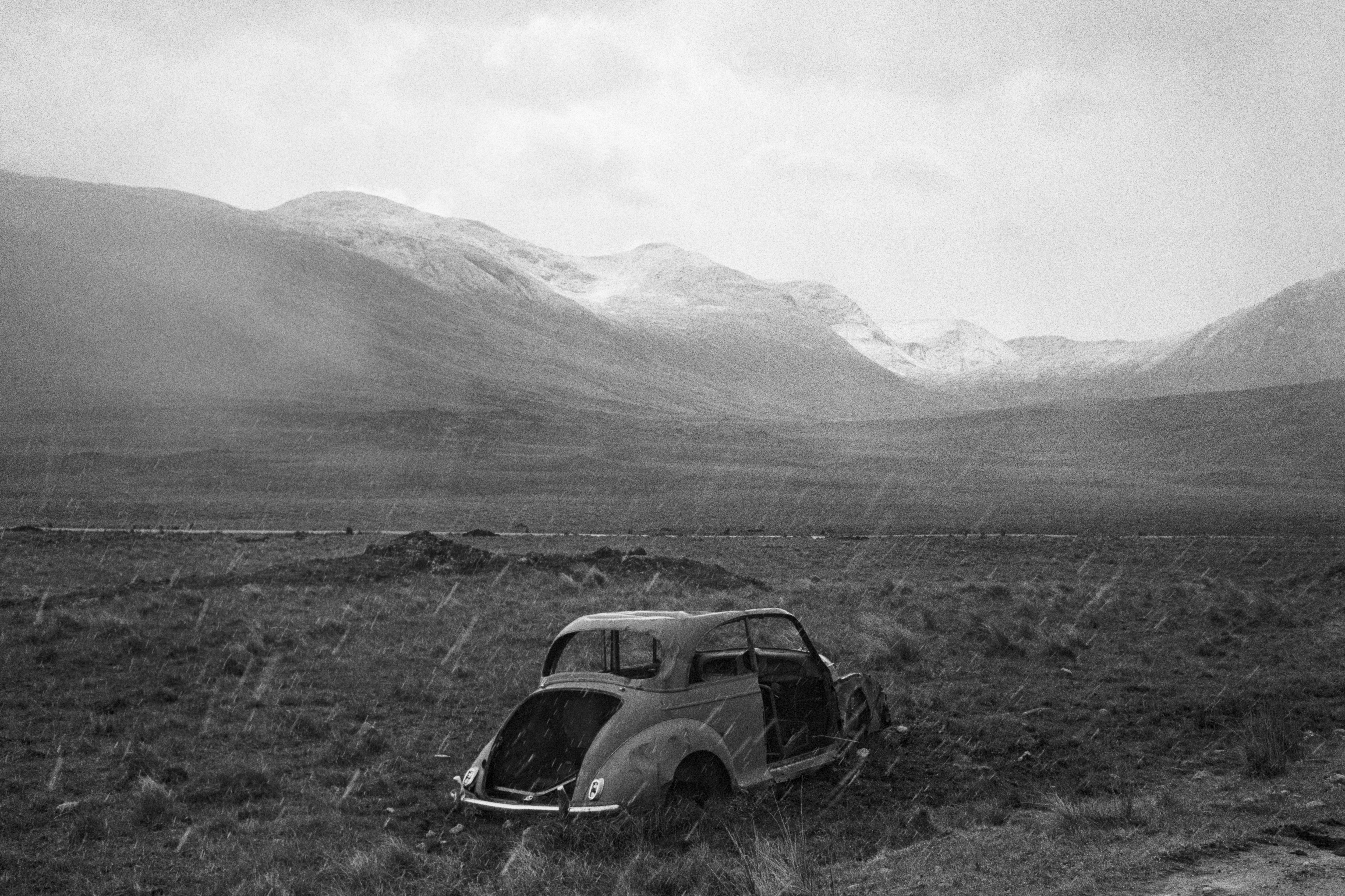 Martin Parr photograph of old car in the rain