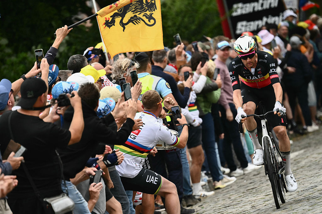 UAE Team Emirate - XRG team's Belgian rider Tim Wellens cycles in a lone breakaway in the ascent of Cote de Cassel to secure the King of the Mountain points at the summit, during the 3rd stage of the 112th edition of the Tour de France cycling race, 178.3 km between Valenciennes and Dunkerque (Dunkirk), Northern France, on July 7, 2025. (Photo by Marco BERTORELLO / AFP) (Photo by MARCO BERTORELLO/AFP via Getty Images)