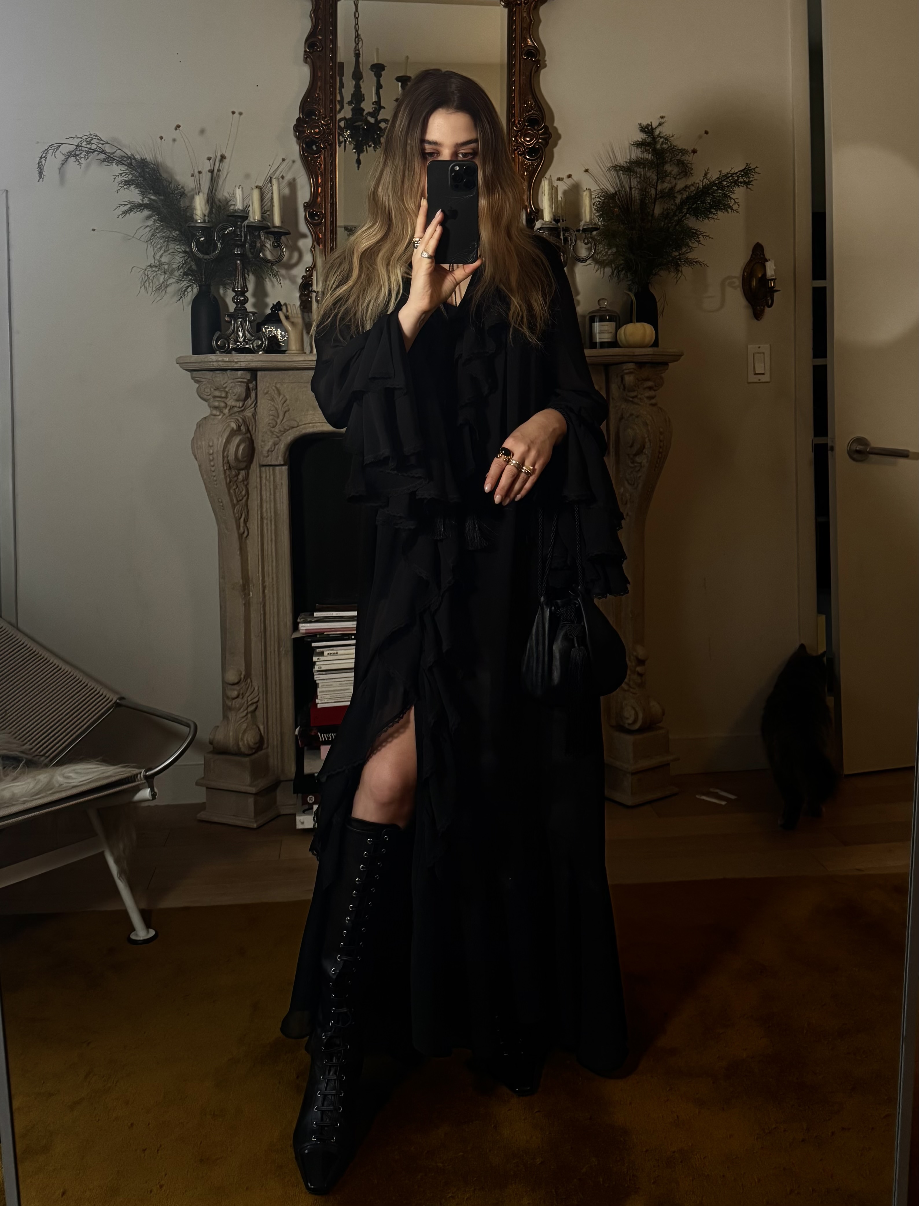 Christina Grasso wearing Victorian boots with a long black dress