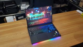 black gaming laptop with cyberpunk running