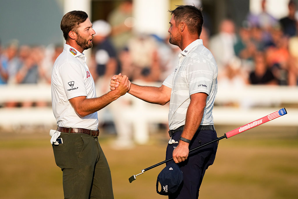 Sam Burns and Bryson DeChambeau shake hands at The Open