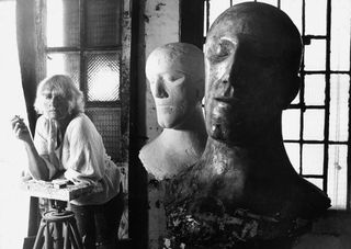 Elisabeth Frink and 'Tribute Heads' in her Southwark studio, 1975