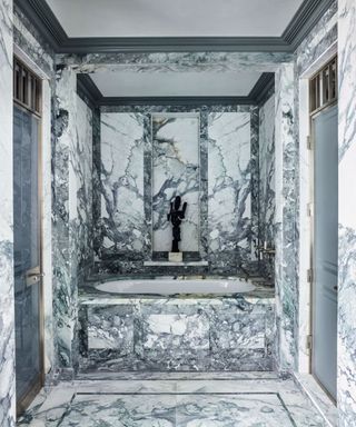 Dramatically veined marble bathroom